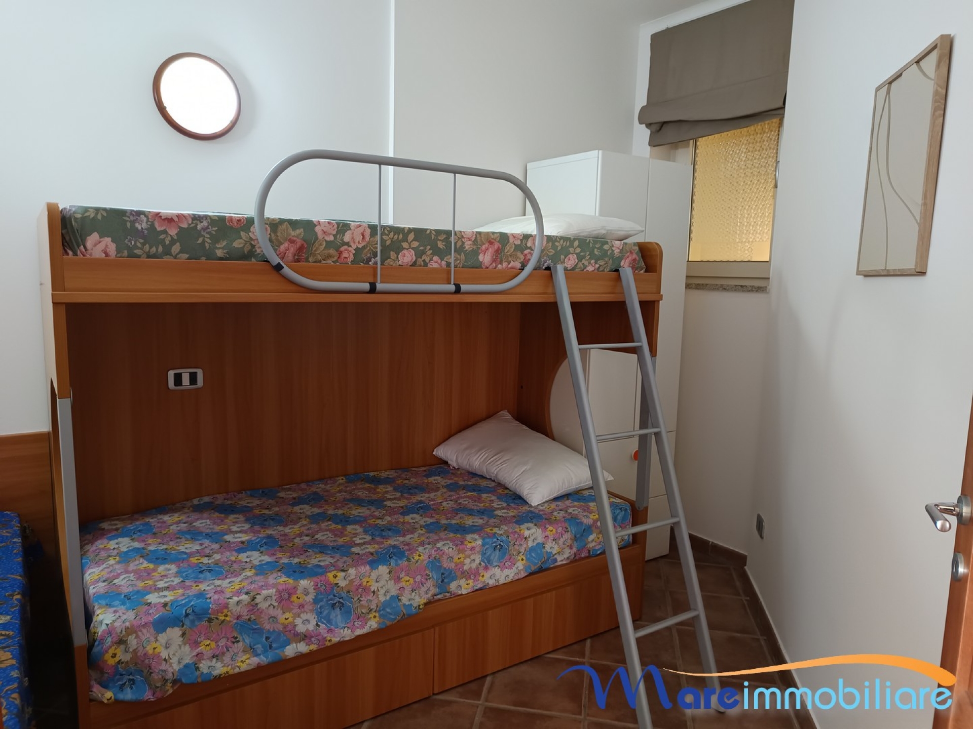 fronte mare con 2 camere e posto auto